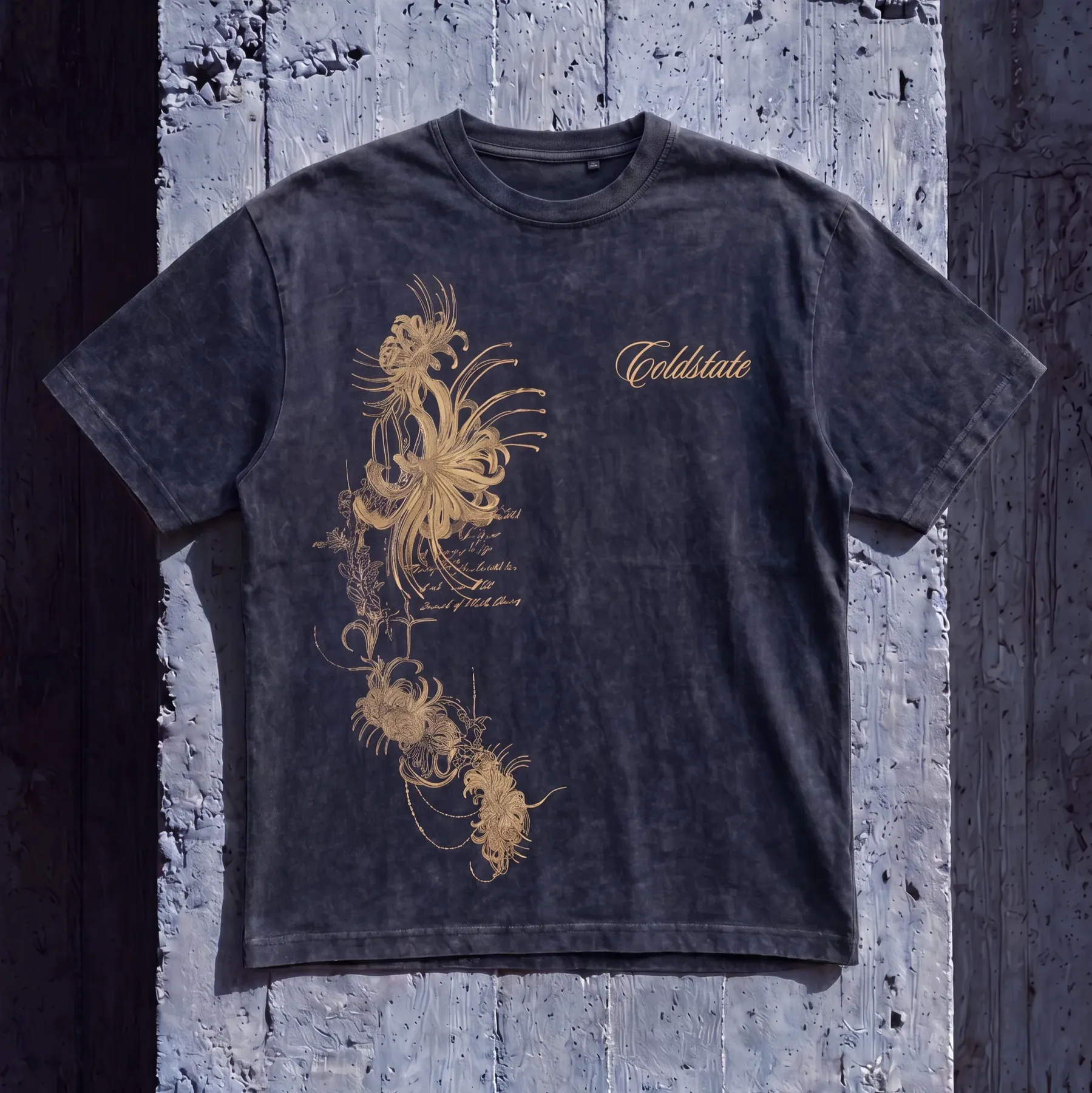 Washed black Cold State T-shirt with gold floral artwork and script logo